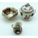 A 19TH CENTURY FRENCH SEVRES PORCELAIN TWIN HANDLED SUCRIER AND COVER together with a miniature Bloo