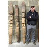 THREE AFRICAN TRIBAL YORUBA CARVED WOOD POSTS of figural form. Largest 192 cm long. (3)