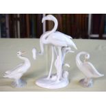 AN AUSTRIAN VIENNA PORCELAIN GROUP OF FLAMINGOS together with two Lladro porcelain ducks. Largest 23