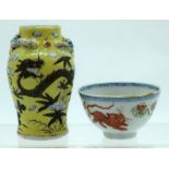 A RARE 19TH CENTURY CHINESE EXPORT TEABOWL together with a yellow glazed vase. Largest 11 cm high. (
