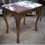 AN 18TH/19TH CENTURY CONTINENTAL GILTWOOD MARBLE TOPPED TABLE formed with scrolling foliage and vine