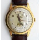 A VINTAGE CORNAVIN MOONPHASE WRISTWATCH with calendar aperture. 3.25 cm wide.