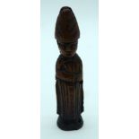 A RARE 18TH CENTURY NORTHERN EUROPEAN CARVED TREEN WOOD FIGURE OF A SAINT modelled in typical religi