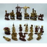 A RARE 19TH CENTURY INDIAN POLYCHROMED BONE AND WOOD CHESS SET modelled as figures upon horses, elep