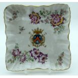 AN 18TH/19TH CENTURY FRENCH FAIENCE SQUARE FORM DISH painted with flowers. 19 cm square.