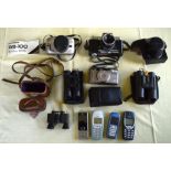 A COLLECTION OF VINTAGE 35MM CAMERAS together with four vintage Nokia phones, binoculars etc. (qty)