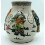 A 19TH CENTURY CHINESE FAMILLE VERTE LOBED FIGURAL VASE decorated with figures within landscapes. 22