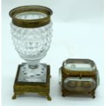 A 19TH CENTURY FRENCH PALAIS ROYALE TYPE SCENT BOTTLE HOLDER and a similar cut glass vase. Largest 1