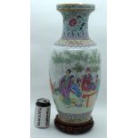 A LARGE CHINESE REPUBLICAN PERIOD FAMILLE ROSE PORCELAIN VASE painted with figures within landscapes