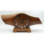 AN EARLY 20TH CENTURY ENGLISH CARVED RAF PROPELLOR CLOCK upon a shaped base, with chrome numerals. 5