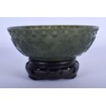 A RARE 19TH CENTURY MIDDLE EASTERN ISLAMIC CARVED JADE BOWL decorated in the Mughal style with flowe