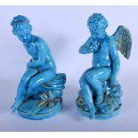 A PAIR OF 19TH CENTURY EUROPEAN BLUE GLAZED PORCELAIN FIGURES Minton or Sevres, modelled upon natura