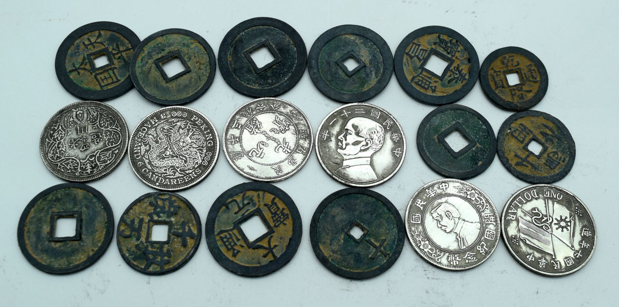 A collection of Chinese coins and tokens