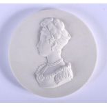 A FRENCH BISQUE PORCELAIN CIRCULAR TABLET PLAQUE possibly Sevres, depicting a female. 10 cm diameter