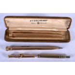 TWO VINTAGE 9CT GOLD PENS together with a yellow metal eversharp & another. Gold 31 grams overall. (