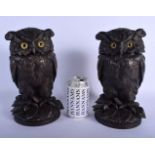 A RARE PAIR OF 19TH CENTURY EUROPEAN BRONZE TOBACCO JARS AND COVERS in the form of owls. 27 cm x 12