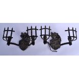 A PAIR OF VINTAGE MEDIEVAL KNIGHT WALL SCONCES. 20 cm x 24 cm.