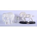 A ROYAL DOULTON WHITE GLAZED PORCELAIN ELEPHANT together with another figure of a horse. Largest 21