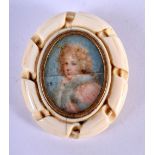 AN ANTIQUE PAINTED IVORY PORTRAIT MINIATURE. 4 cm x 3.5 cm.