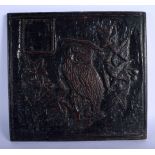 A CHARMING 17TH CENTURY ENGLISH CARVED OAK SQUARE FORM TILE possibly a Roof Boss, depicting an owl p