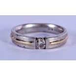 A 14CT GOLD AND SILVER DIAMOND RING. 8 grams. V/W.