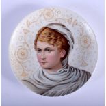 AN EARLY 20TH CENTURY EUROPEAN PORCELAIN PORTRAIT PLATE painted with a female. 15.5 cm diameter.