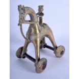 AN EARLY 20TH CENTURY INDIAN BRONZE FIGURE OF A HORSE possibly a toy. 14 cm x 17 cm.