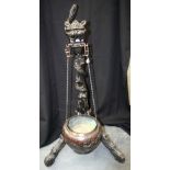 A RARE 19TH CENTURY FRANCO JAPANESE HARDWOOD AND BRONZE HANGING JARDINIERE STAND formed as a scowlin