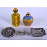 THREE CHINESE WHITE METAL INGOTS together with two enamelled peking glass bottles. (5)