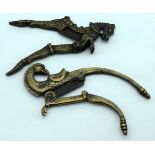 An Asian brass nut cracker in the shape of a horse together with a bird nutcracker. 19cm (2).
