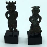 Two small South East Asian bronze figures on stands . 7cm (2).