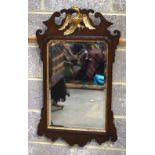 AN ANTIQUE MIRROR. 94 cm x 55.5 cm.