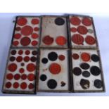 A COLLECTION OF 17TH/18TH CENTURY EUROPEAN WAX SEALS within leather bound boxes, of German & Austria