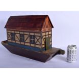 A CHARMING ANTIQUE PAINTED WOOD NOAHS ARK containing 50 pairs of animals. Ark 57 cm x 35 cm.