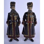 A PAIR OF CONTINENTAL COLD PAINTED BRONZE FIGURES OF COSSACKS. 18 cm high.