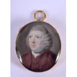 AN ANTIQUE GOLD MOUNTED PORTRAIT IVORY MINIATURE. 12 grams. 4 cm x 3.5 cm.