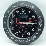 A contemporary Rolex type wall clock 34cm.