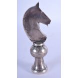 A SILVER PLATED KNIGHT CHESS PIECE. 12 cm high. 310 grams.