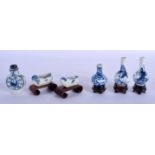 A VERY RARE PAIR OF 18TH/19TH CENTURY CHINESE MINIATURE BLUE AND WHITE BOTTLES together with four ot