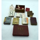 A collection of vintage playing cards and a set of chess pieces (Qty)