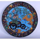 A LATE 19TH CENTURY JAPANESE MEIJI PERIOD CLOISONNE ENAMEL DISH decorated with a cart pulling foliag