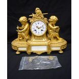 A LARGE 19TH CENTURY FRENCH ORMOLU AND MARBLE MANTEL CLOCK formed with seated putti. 32 cm x 30 cm.