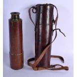 A LARGE ANTIQUE FIVE DRAWER BRASS TELESCOPE within a leather case. 103 cm extended.