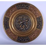 AN EARLY 20TH CENTURY INDIAN MIXED METAL BRASS COPPER AND SILVER DISH decorated with a central buddh