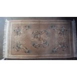 AN ART DECO STYLE CHINESE RUG. 154 cm x 87 cm.
