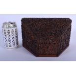 A 19TH CENTURY INDIAN CARVED SANDALWOOD TRIANGULAR FORM BOX AND COVER the top rising to reveal a let