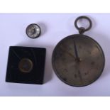 THREE ANTIQUE COMPASS in various forms. Largest 5.25 cm wide. (3)