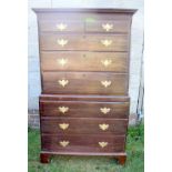 AN ANTIQUE OAK TALL BOY CHEST ON BASE with brass handles and reeded side rails. 188 cm x 95 cm.