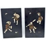 A pair of Japanese wooden panels decorated with carved Ivory figures 39 x 25cm (2)