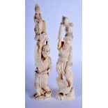 TWO LATE 19TH CENTURY JAPANESE MEIJI PERIOD CARVED IVORY OKIMONO modelled holding aloft figures and
